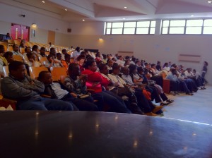 Robert Morris Middle School students listening to the storyteller on World Voice Day